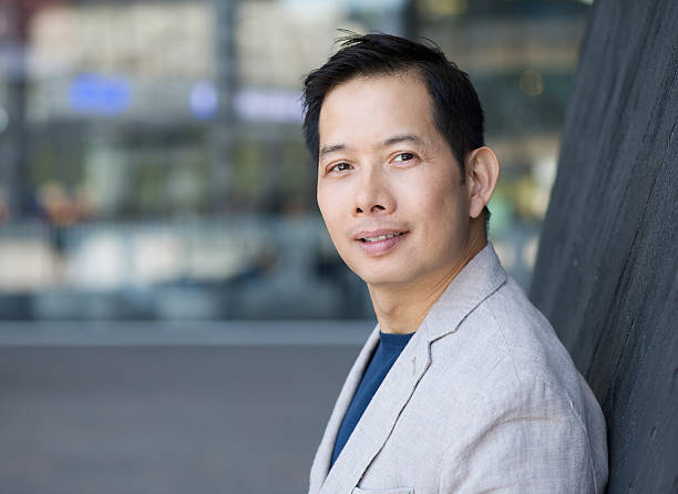 Horizontal portrait of a handsome middle aged asian man